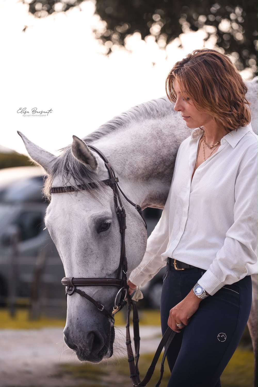 Alice Orlandi with a grey horse